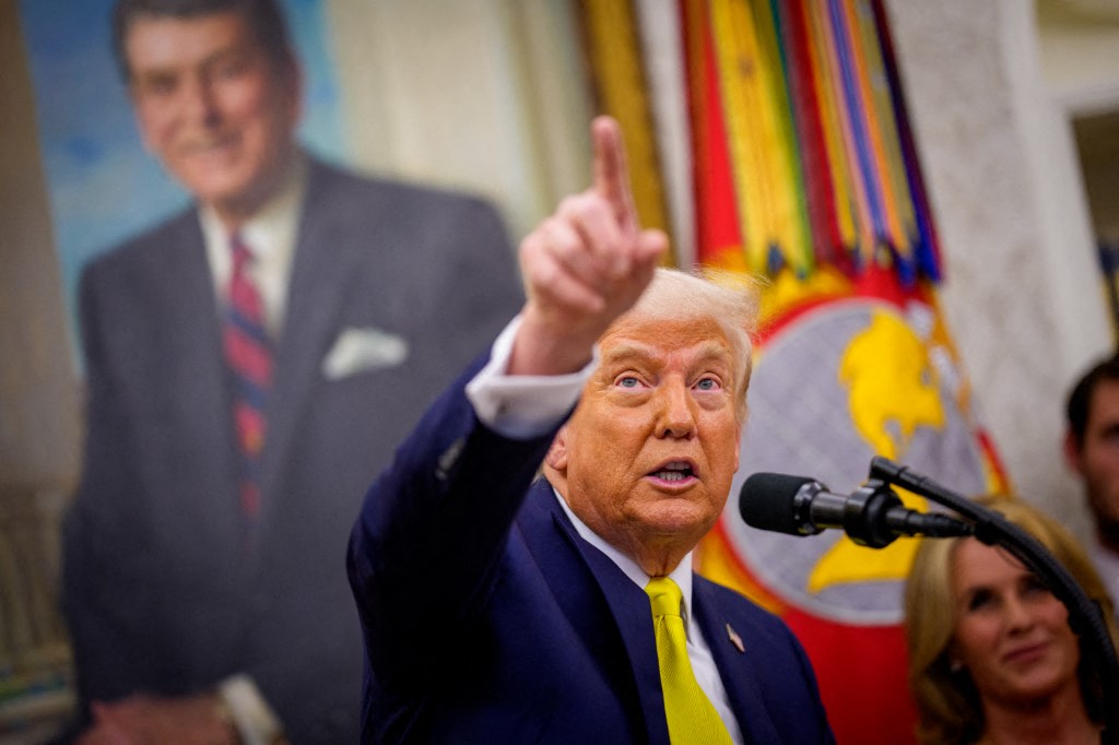 Trump escalates immigration crackdown to mark 100 days