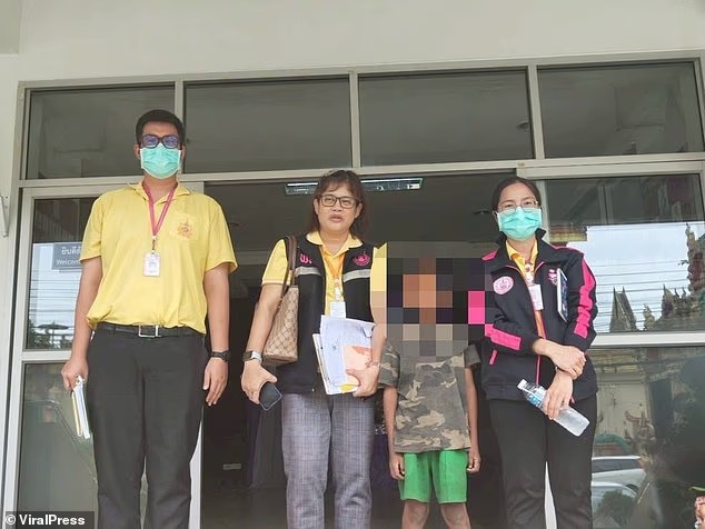 Thai police rescue eight-year-old boy living with dogs, unable to speak